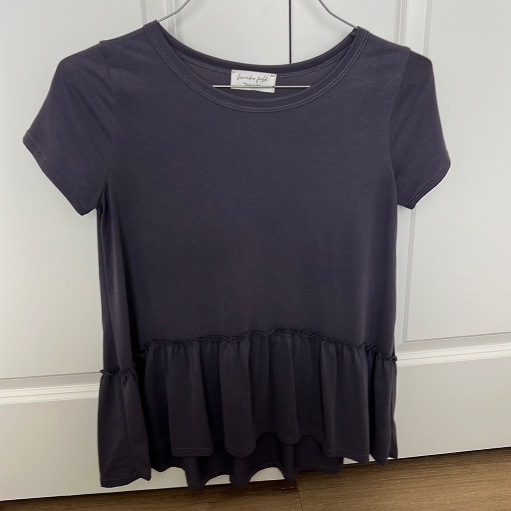 Purple blouse with ruffle bottom